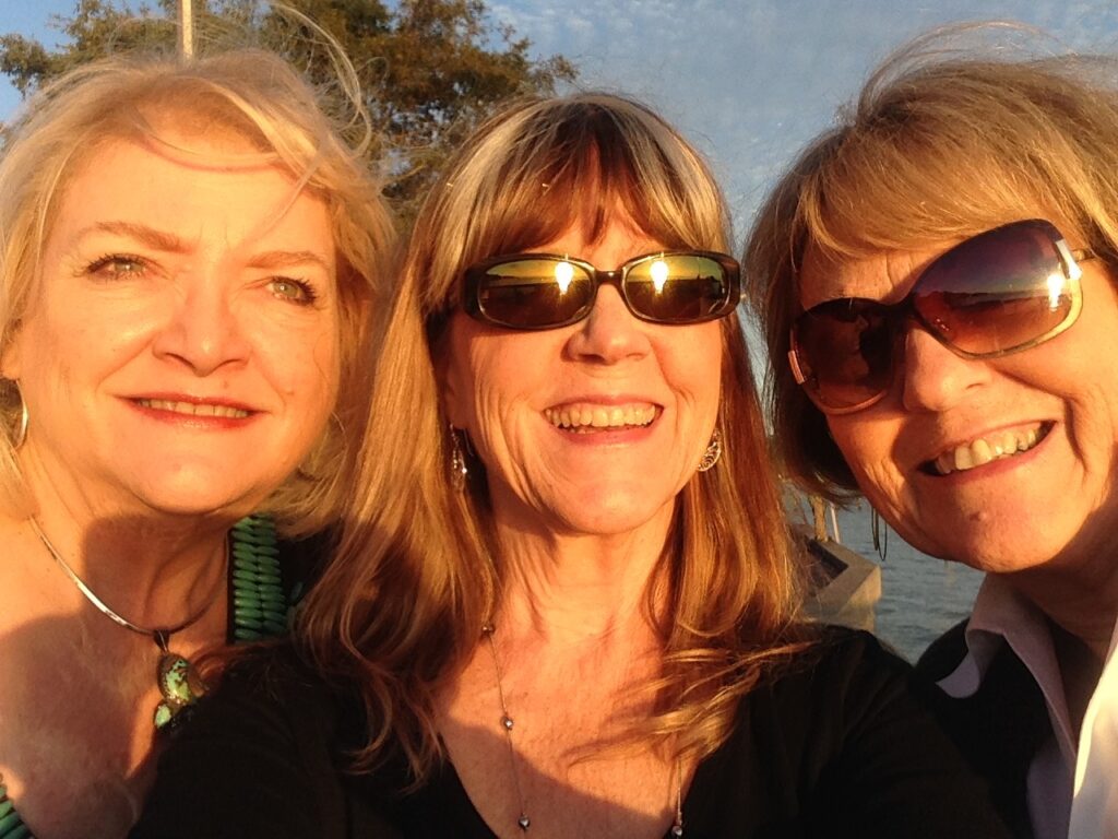 Ren, me and NancyKay at sunset on the Fairhope Pier
