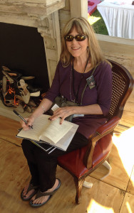 Signing books inside the River's Edge Media tent at the Louisiana Book Festival