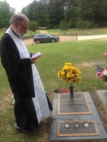 Fr B at Mary grave