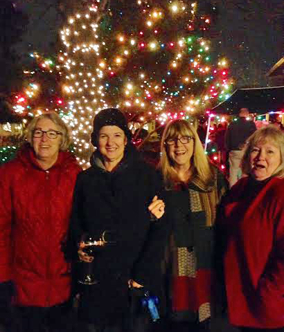Celebrating the lighting of the tree in Christmas Tree Park with neighbors in Harbor Town