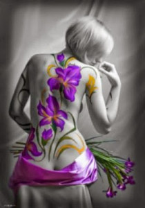 Large Purple Flower tattoo on woman's back