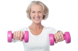 Older-woman-holding-weights