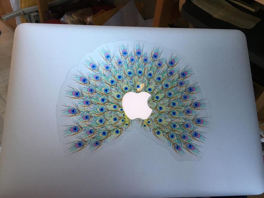 Peacock sticker for my new MacBook Pro, selected for me by almost 5-year-old Gabby.