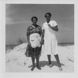 Lilly Bell in the apron, with another family's maid in Florida on our vacation in 1956.