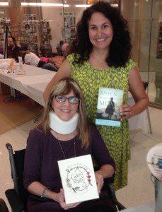 With Julie Cantrell at Bookfest 2013 at the Memphis Library in October, three months after the wreck. (in a wheelchair)