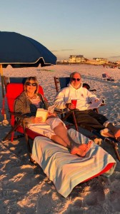 Reading CONGRATULATIONS, WHO ARE YOU AGAIN? at Seagrove Beach on Thanksgiving Day, with my husband, Bill.